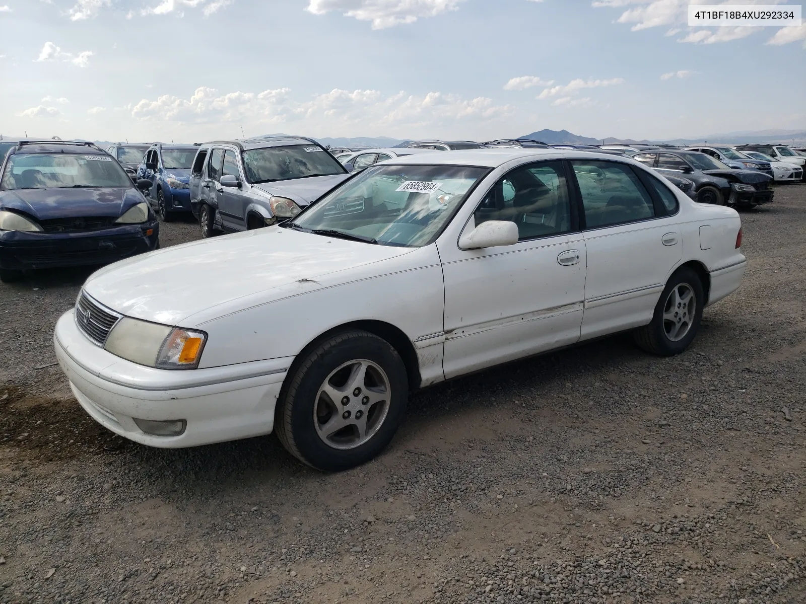 1999 Toyota Avalon Xl VIN: 4T1BF18B4XU292334 Lot: 65852904