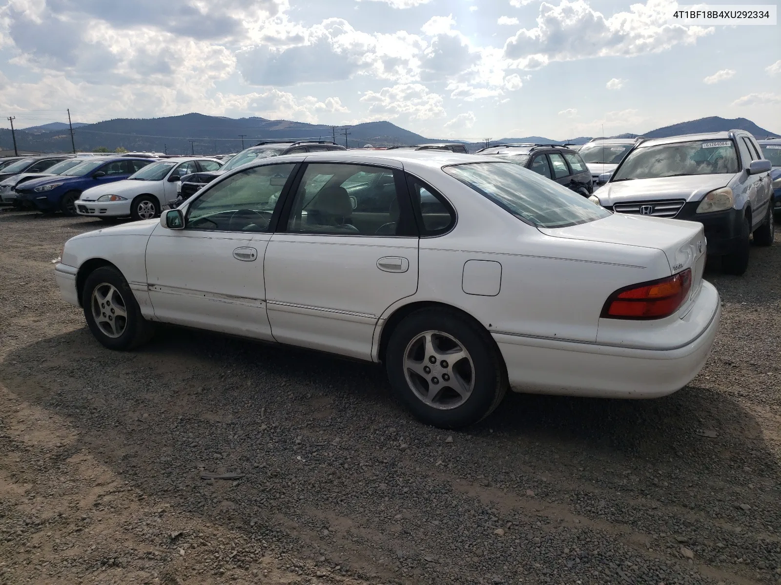 1999 Toyota Avalon Xl VIN: 4T1BF18B4XU292334 Lot: 65852904