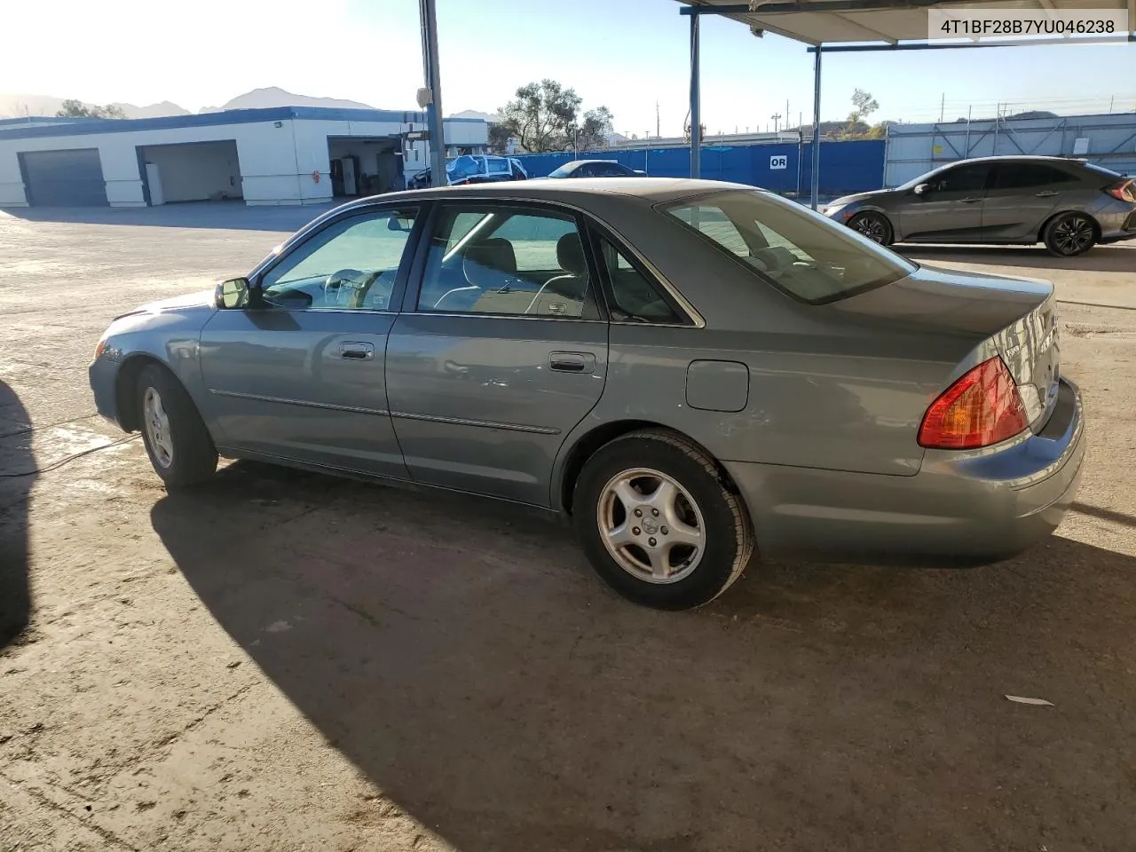 2000 Toyota Avalon Xl VIN: 4T1BF28B7YU046238 Lot: 77665714