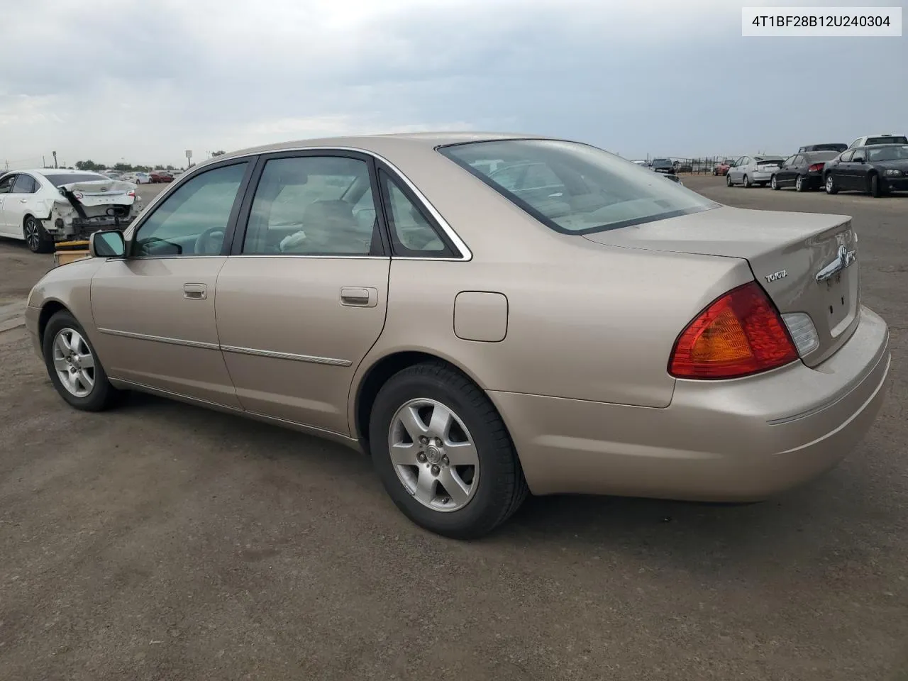 2002 Toyota Avalon Xl VIN: 4T1BF28B12U240304 Lot: 65854714