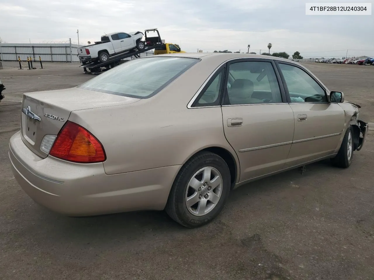 2002 Toyota Avalon Xl VIN: 4T1BF28B12U240304 Lot: 65854714