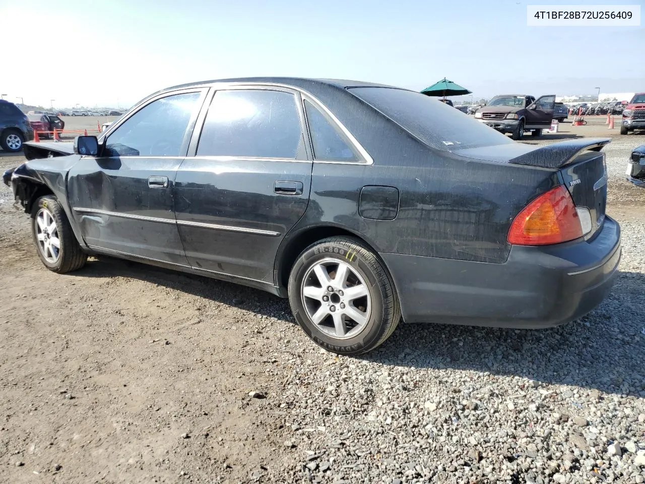 2002 Toyota Avalon Xl VIN: 4T1BF28B72U256409 Lot: 70896344