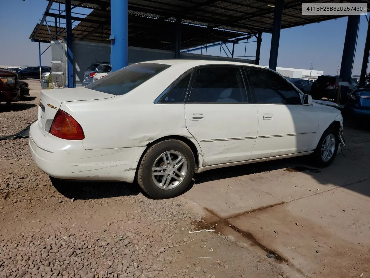 2002 Toyota Avalon Xl VIN: 4T1BF28B32U257430 Lot: 71272054