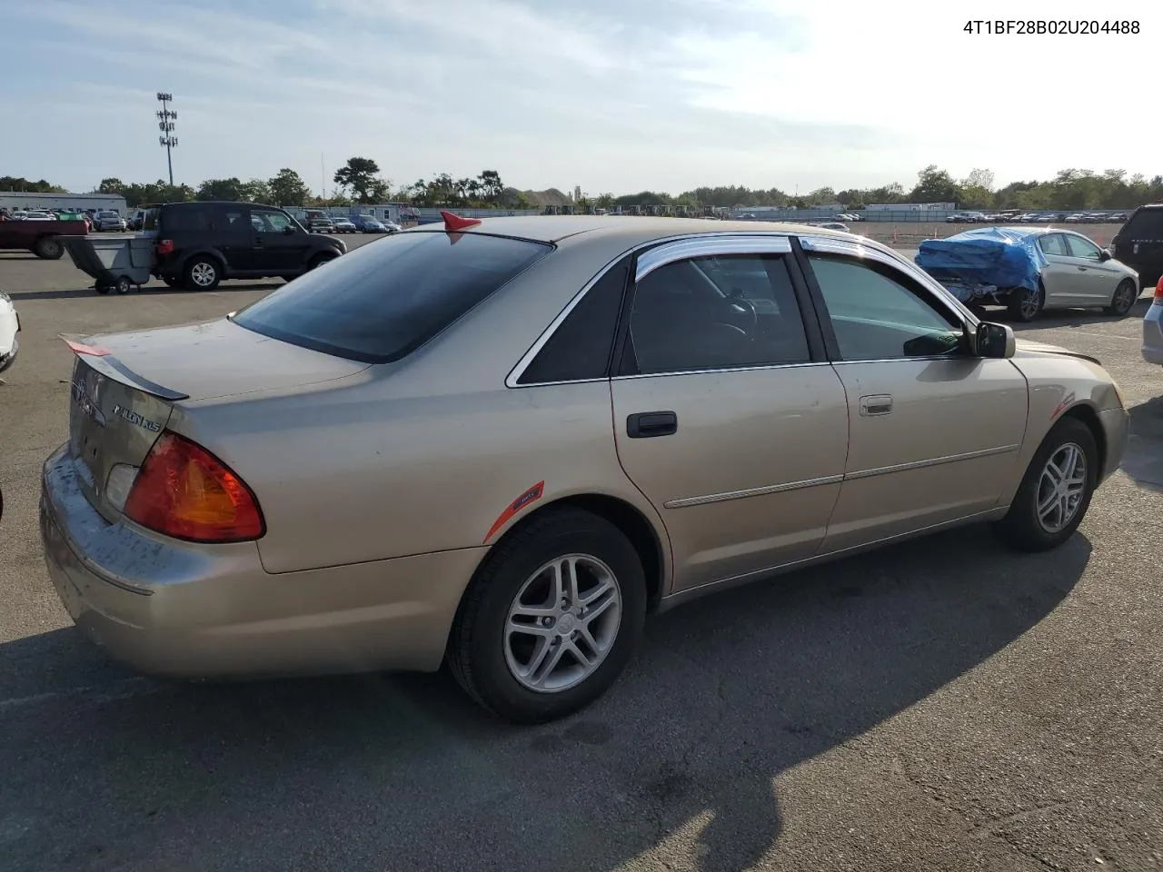 2002 Toyota Avalon Xl VIN: 4T1BF28B02U204488 Lot: 72077844