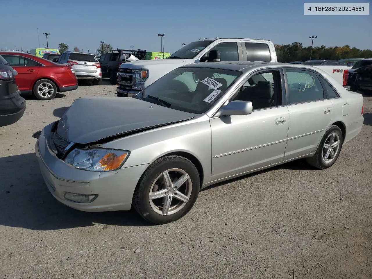 2002 Toyota Avalon Xl VIN: 4T1BF28B12U204581 Lot: 75425344