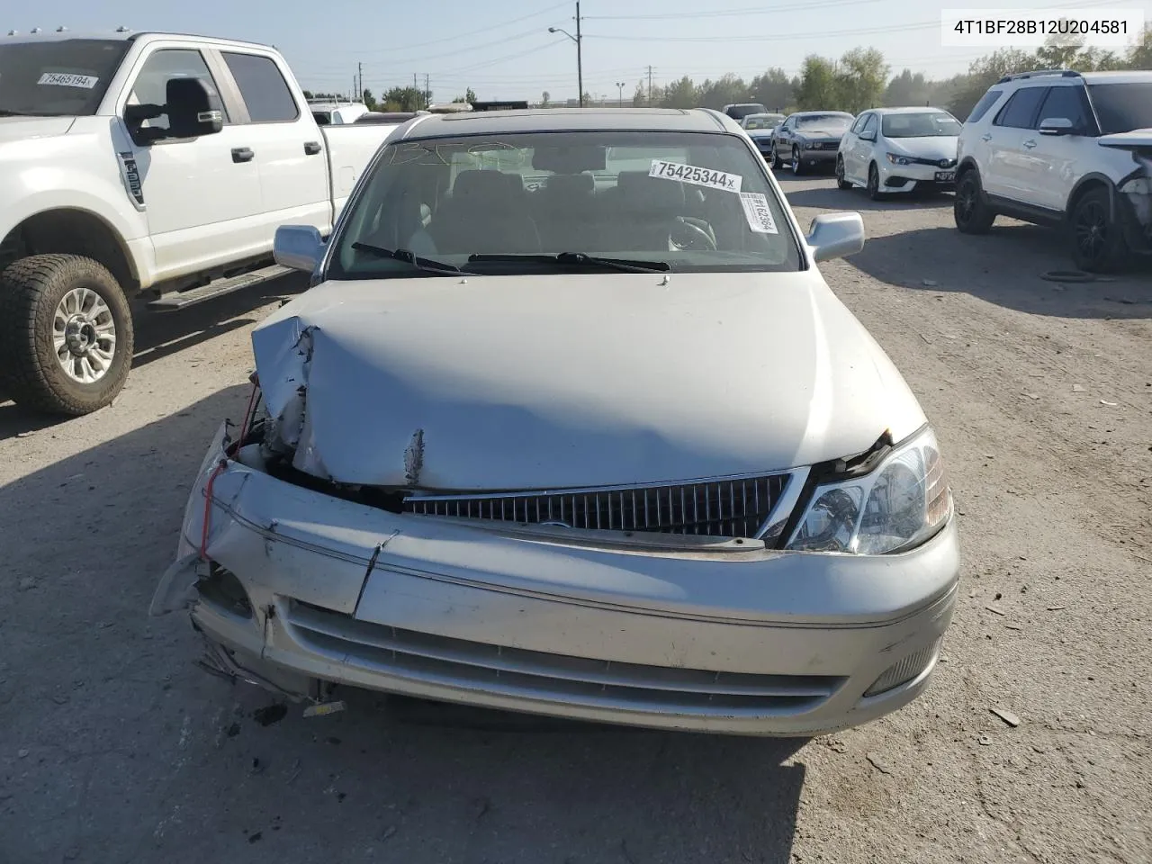 2002 Toyota Avalon Xl VIN: 4T1BF28B12U204581 Lot: 75425344