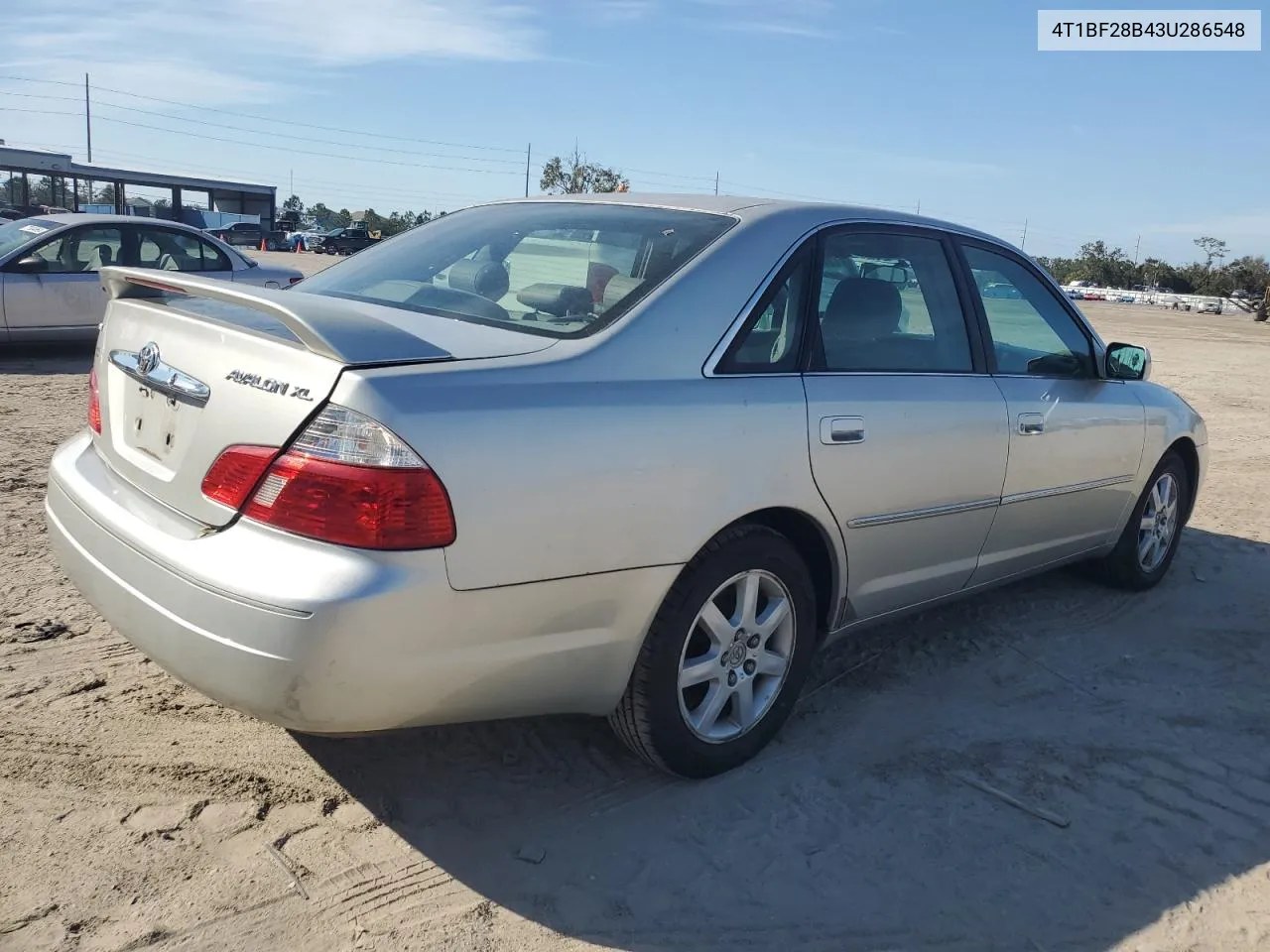 2003 Toyota Avalon Xl VIN: 4T1BF28B43U286548 Lot: 77261454