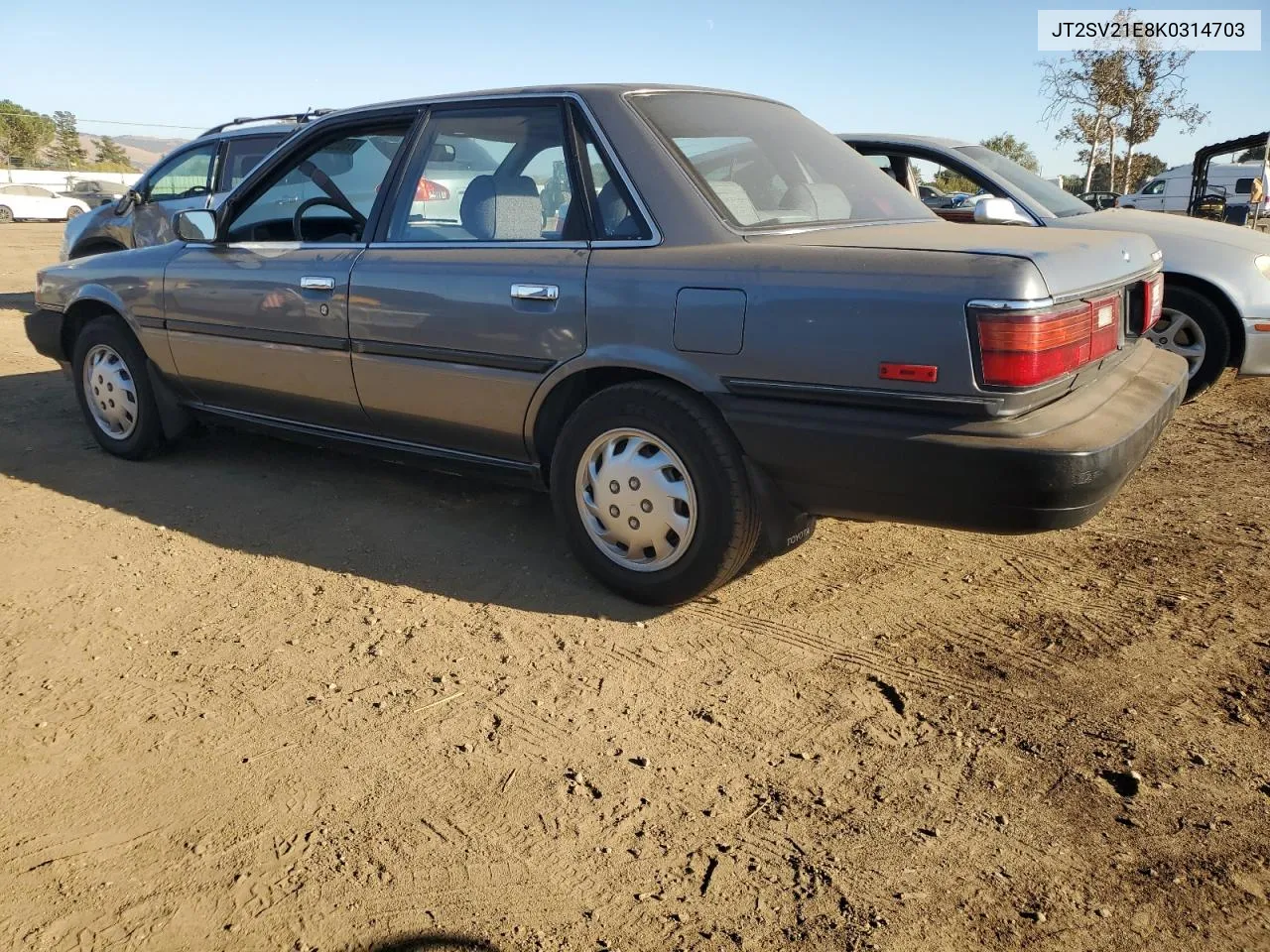 1989 Toyota Camry Dlx VIN: JT2SV21E8K0314703 Lot: 76053194