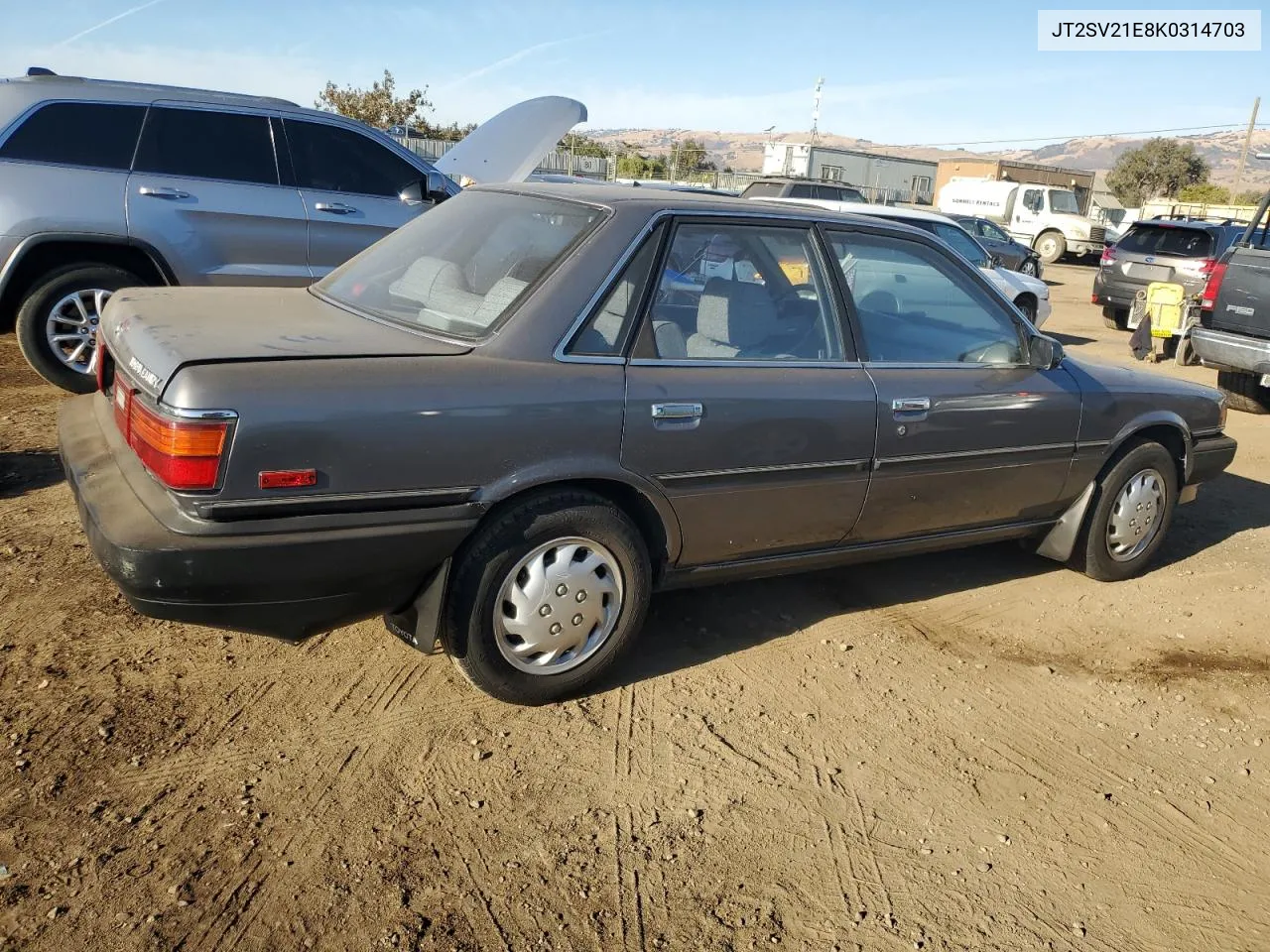 1989 Toyota Camry Dlx VIN: JT2SV21E8K0314703 Lot: 76053194