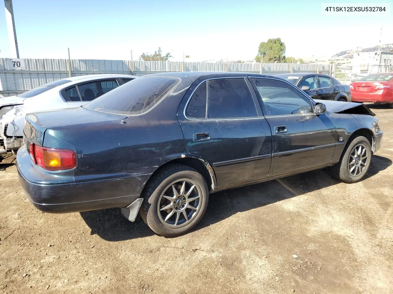 1995 Toyota Camry Le VIN: 4T1SK12EXSU532784 Lot: 71035784