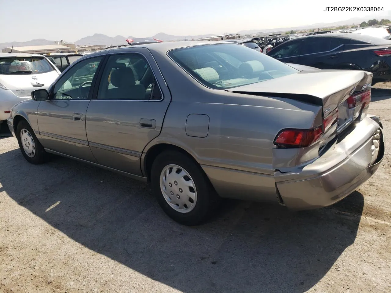 1999 Toyota Camry Le VIN: JT2BG22K2X0338064 Lot: 58110254