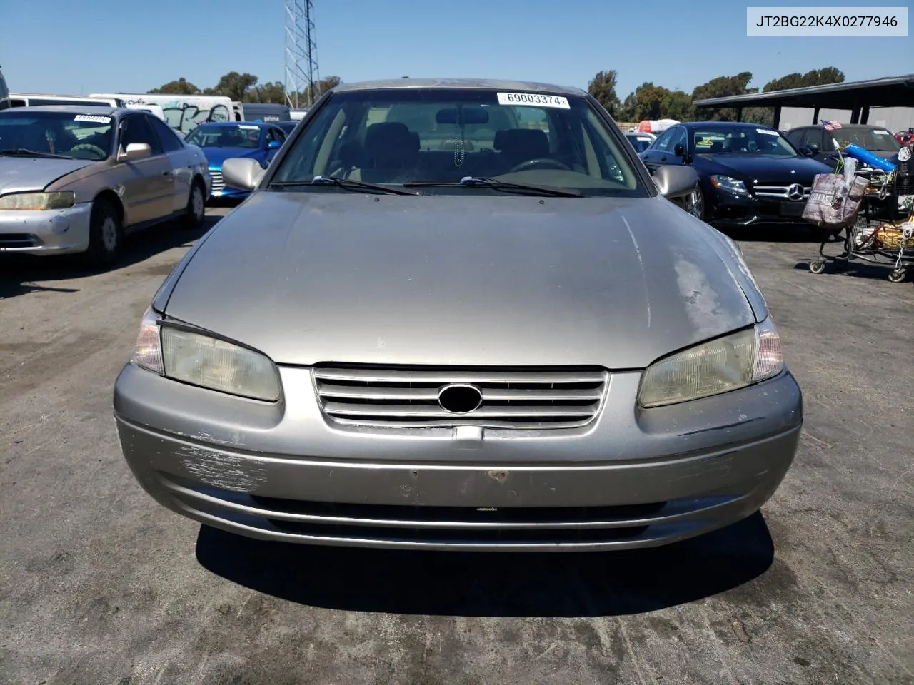 1999 Toyota Camry Le VIN: JT2BG22K4X0277946 Lot: 69003374