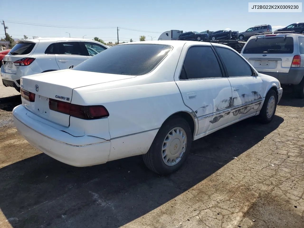 1999 Toyota Camry Le VIN: JT2BG22K2X0309230 Lot: 69339404