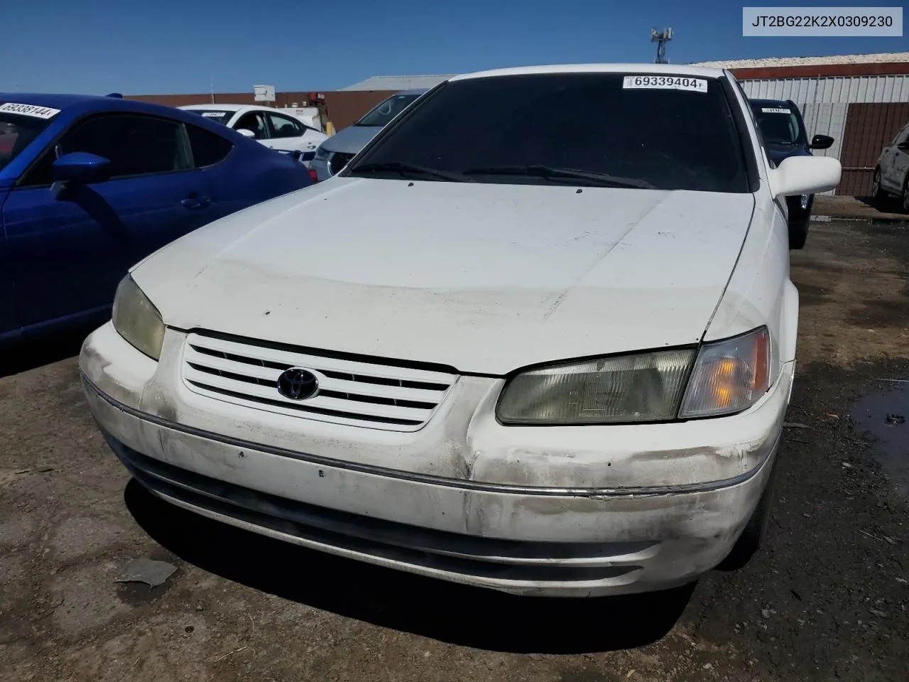 1999 Toyota Camry Le VIN: JT2BG22K2X0309230 Lot: 69339404