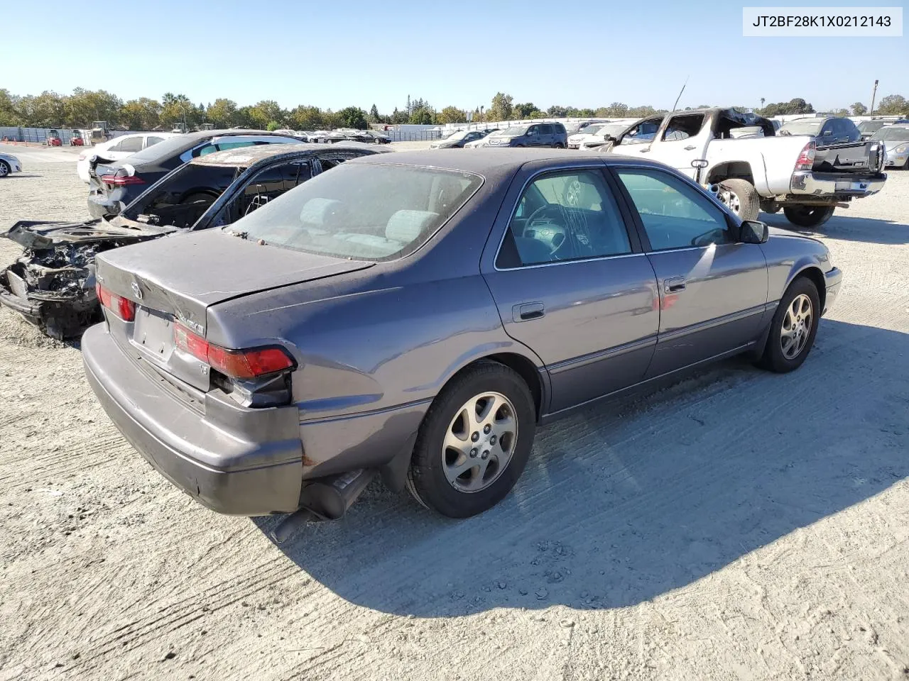 1999 Toyota Camry Le VIN: JT2BF28K1X0212143 Lot: 74116744