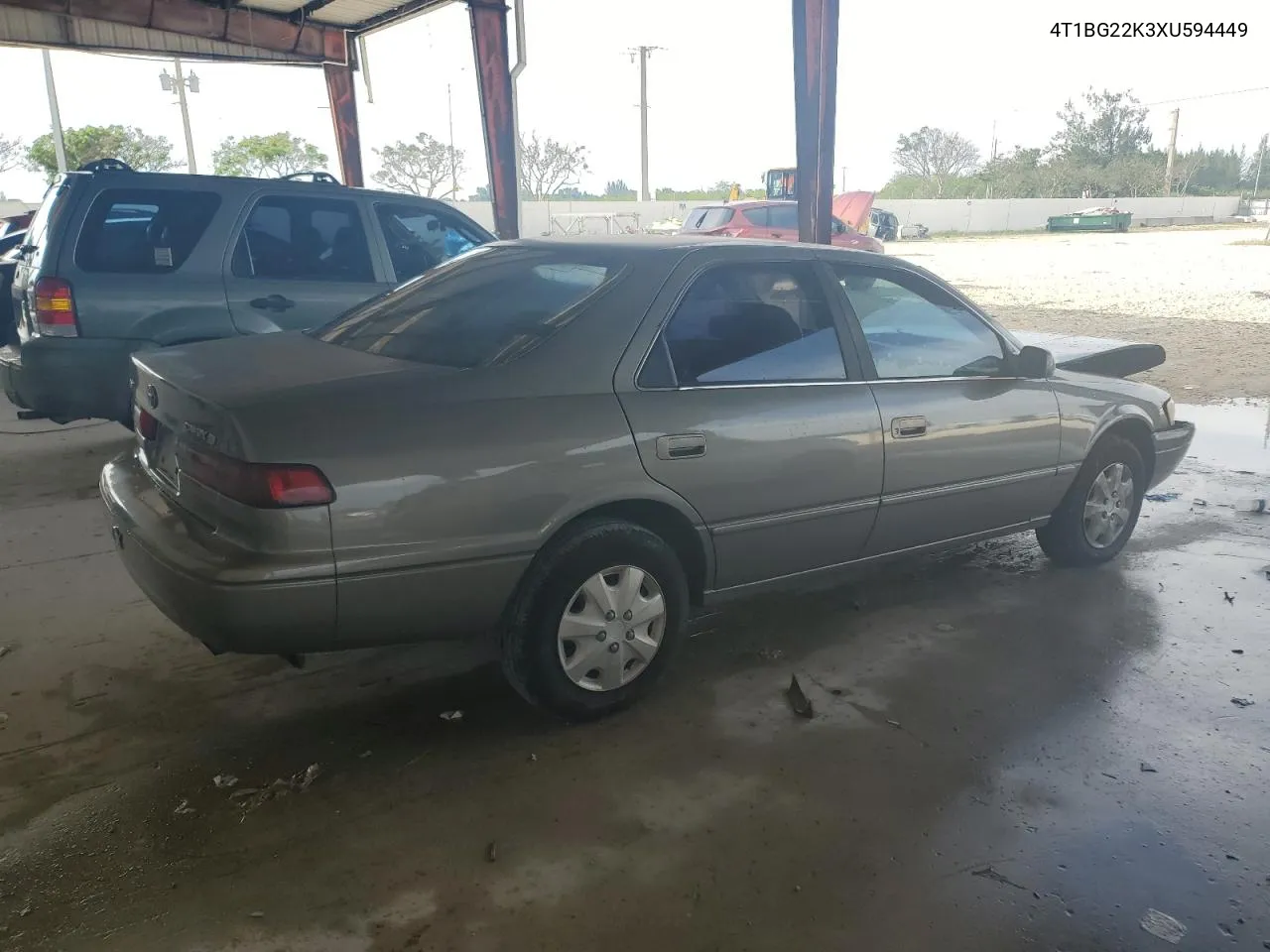 1999 Toyota Camry Ce VIN: 4T1BG22K3XU594449 Lot: 76082444