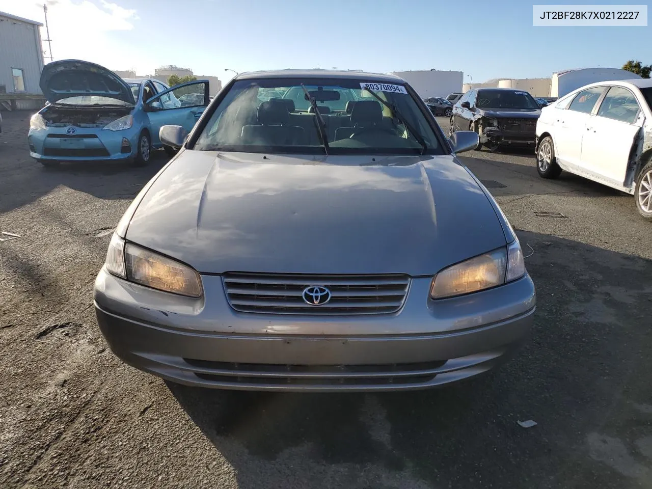 1999 Toyota Camry Le VIN: JT2BF28K7X0212227 Lot: 80370094