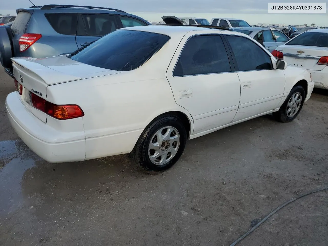 2000 Toyota Camry Le VIN: JT2BG28K4Y0391373 Lot: 75861564