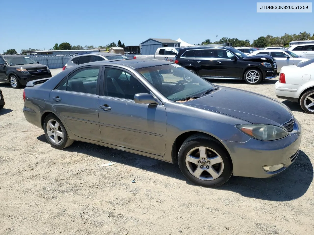 2002 Toyota Camry Le VIN: JTDBE30K820051259 Lot: 62078524