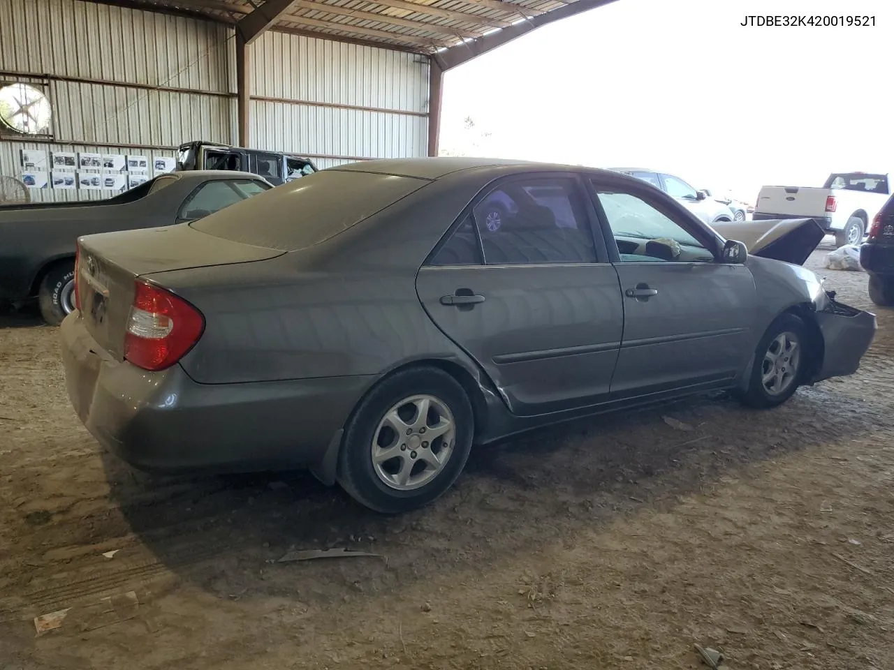 2002 Toyota Camry Le VIN: JTDBE32K420019521 Lot: 75960734