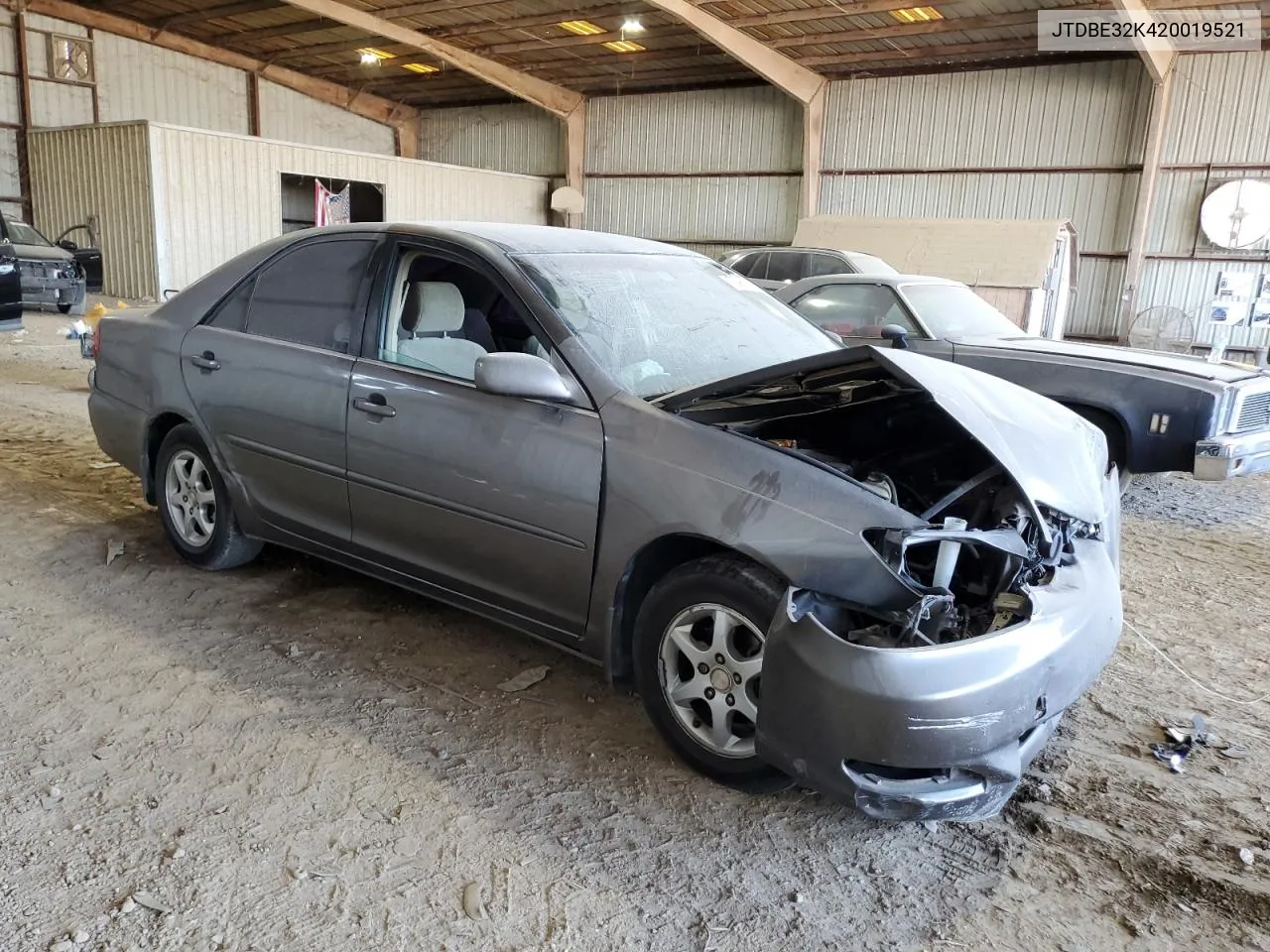 2002 Toyota Camry Le VIN: JTDBE32K420019521 Lot: 75960734