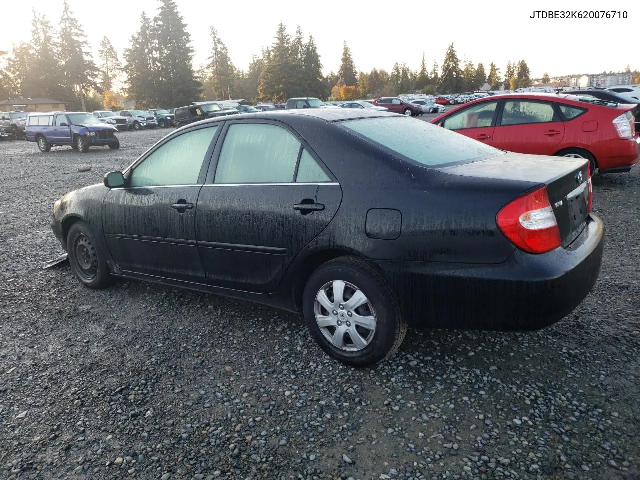 2002 Toyota Camry Le VIN: JTDBE32K620076710 Lot: 77209364