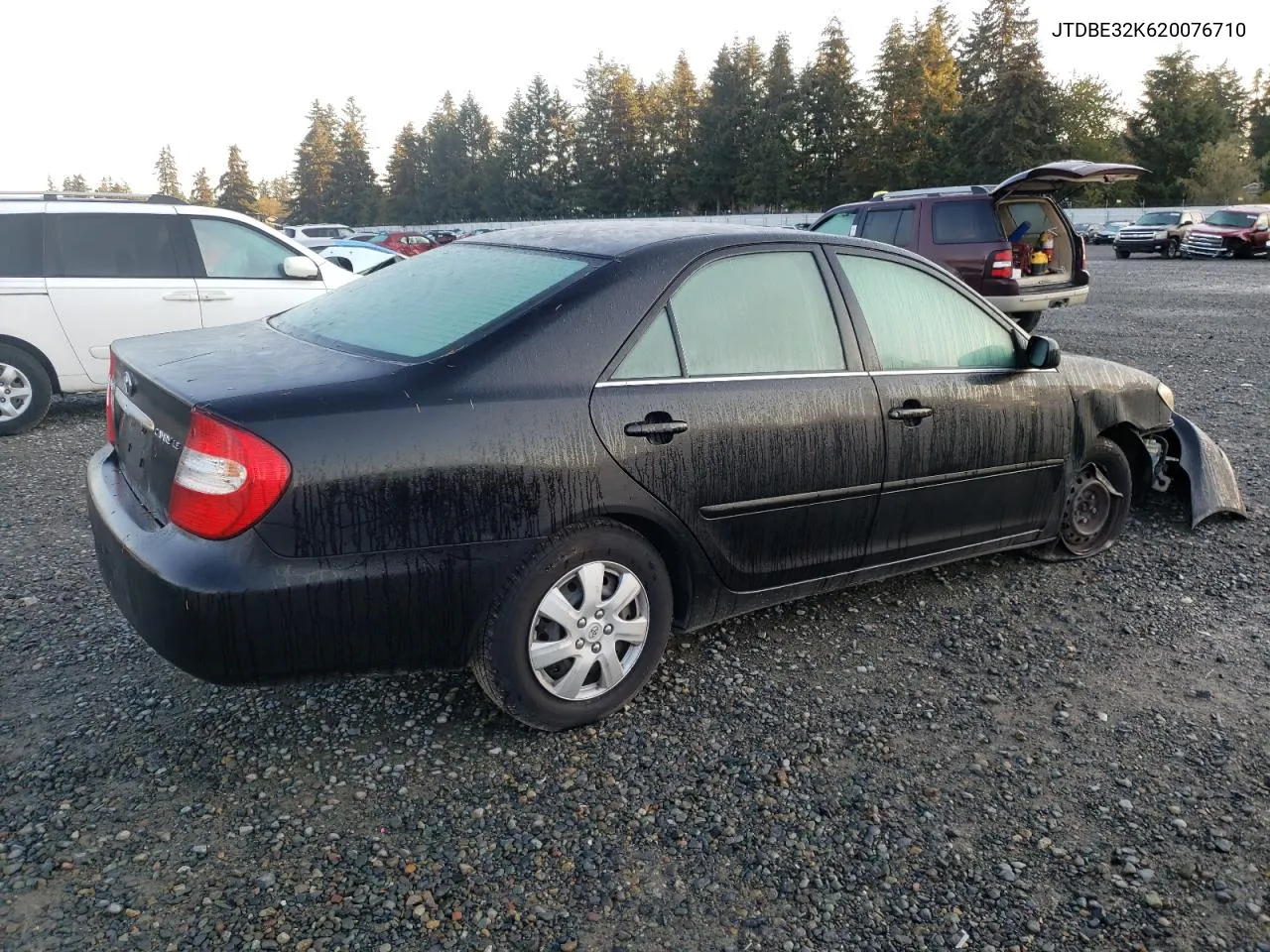 2002 Toyota Camry Le VIN: JTDBE32K620076710 Lot: 77209364