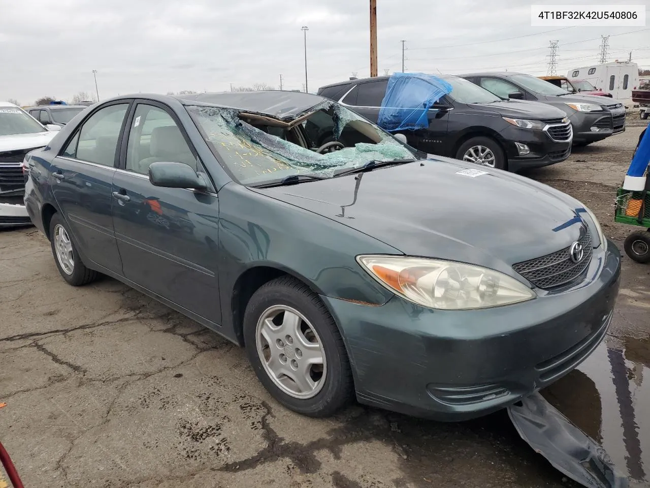 2002 Toyota Camry Le VIN: 4T1BF32K42U540806 Lot: 79926134