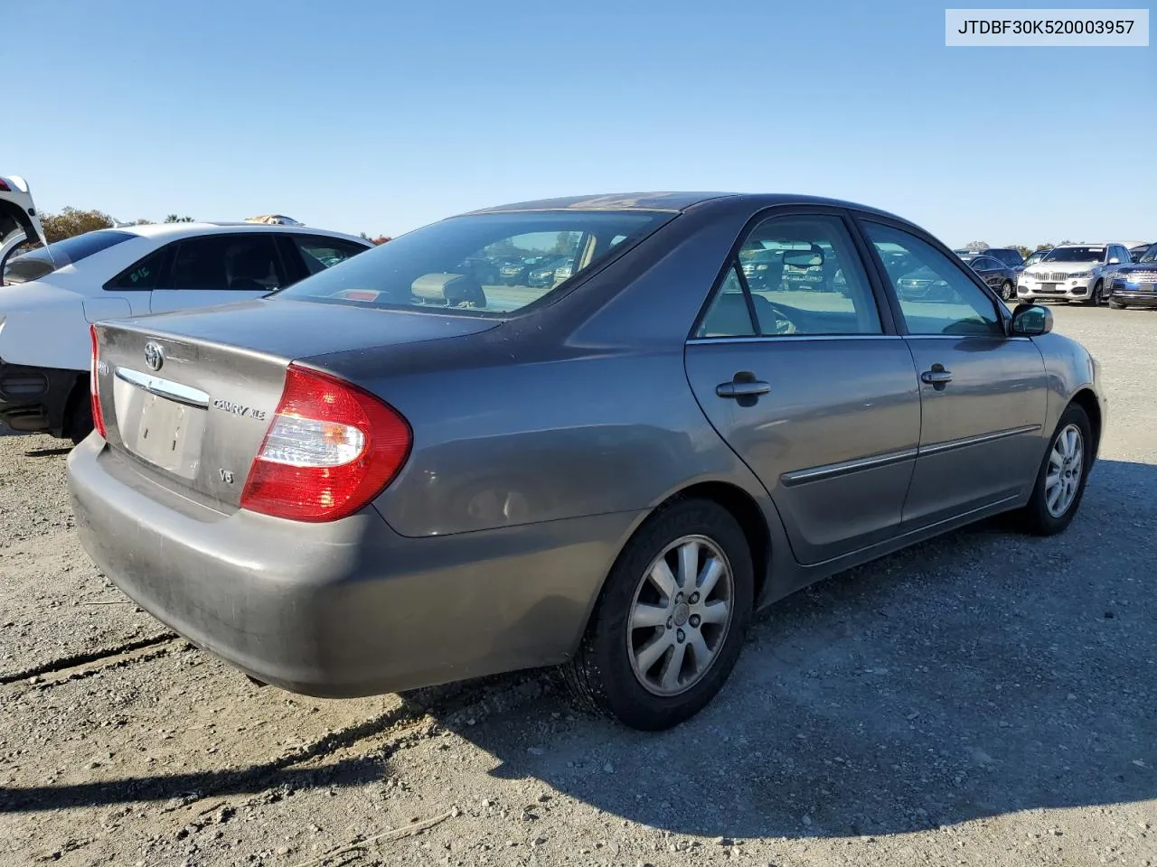 2002 Toyota Camry Le VIN: JTDBF30K520003957 Lot: 81062614