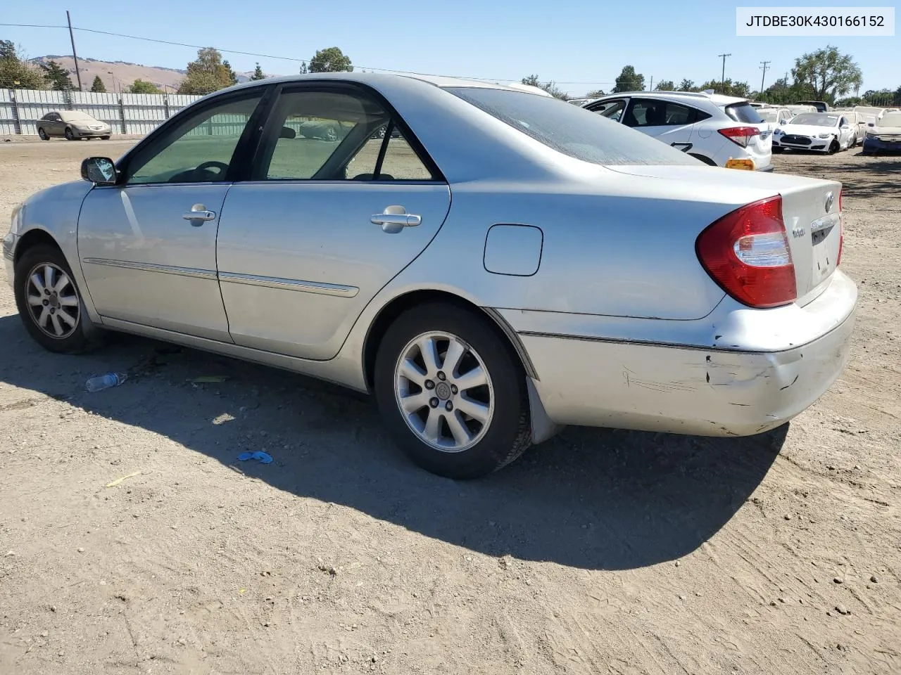 2003 Toyota Camry Le VIN: JTDBE30K430166152 Lot: 70307124