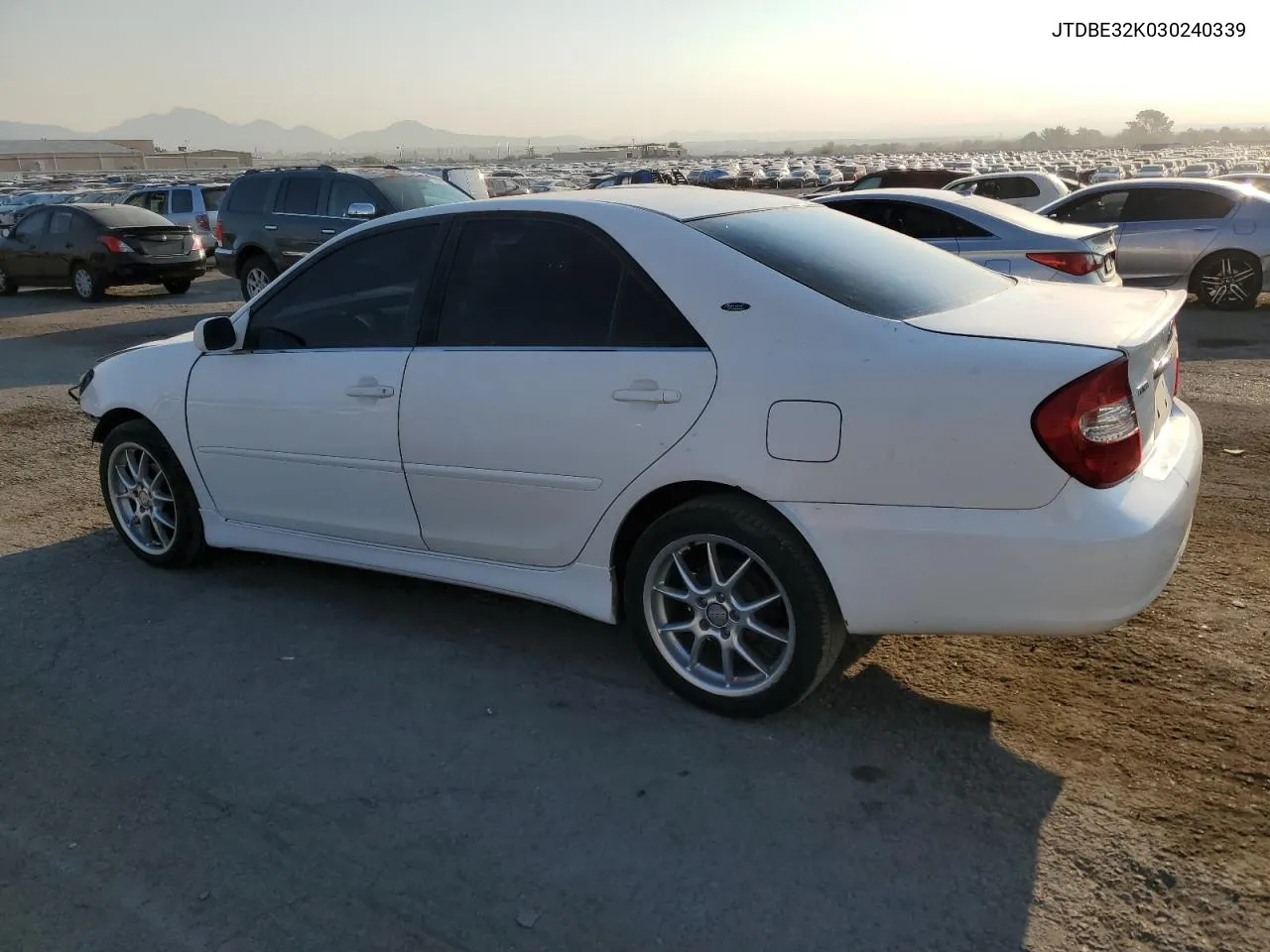 2003 Toyota Camry Le VIN: JTDBE32K030240339 Lot: 70407374