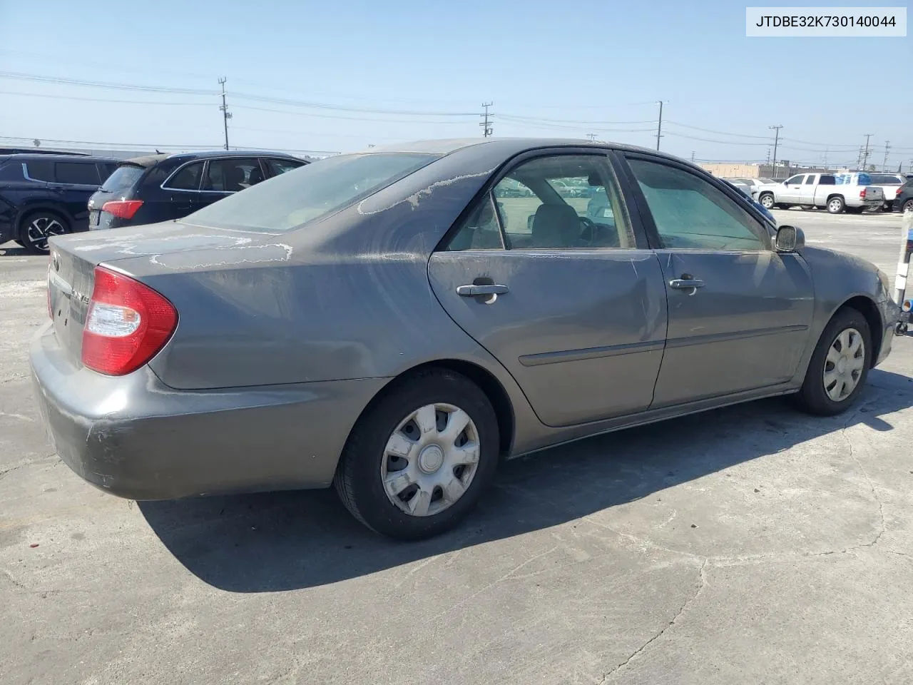 2003 Toyota Camry Le VIN: JTDBE32K730140044 Lot: 73023334