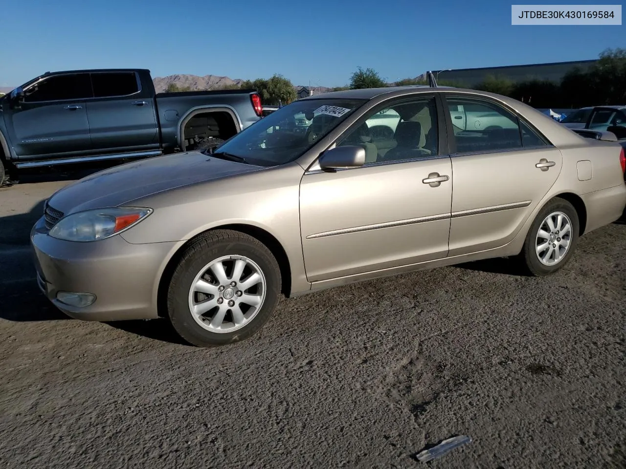 2003 Toyota Camry Le VIN: JTDBE30K430169584 Lot: 75470424