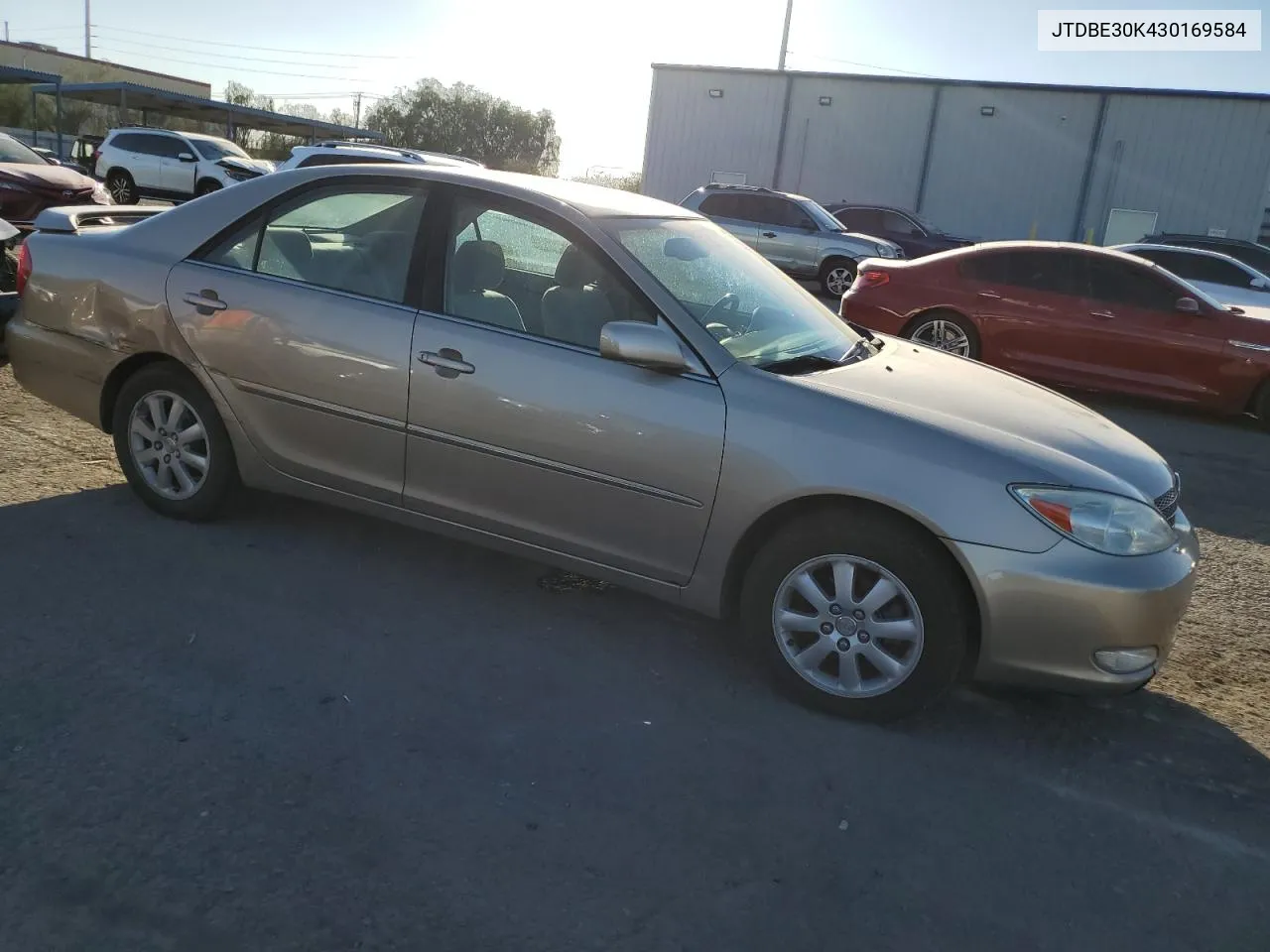 2003 Toyota Camry Le VIN: JTDBE30K430169584 Lot: 75470424