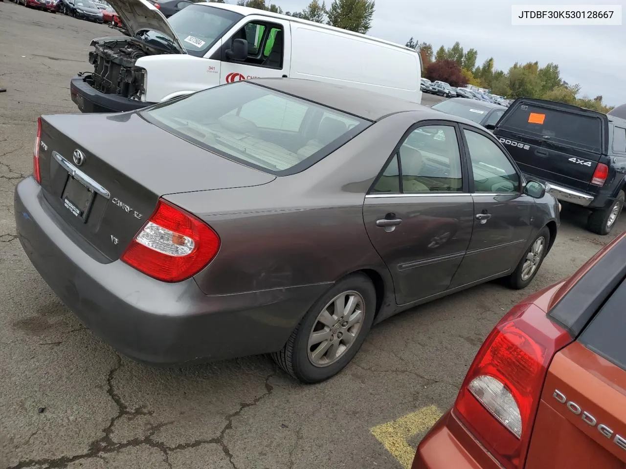 2003 Toyota Camry Le VIN: JTDBF30K530128667 Lot: 76972024