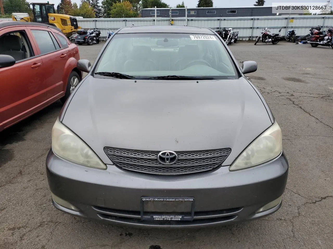 2003 Toyota Camry Le VIN: JTDBF30K530128667 Lot: 76972024