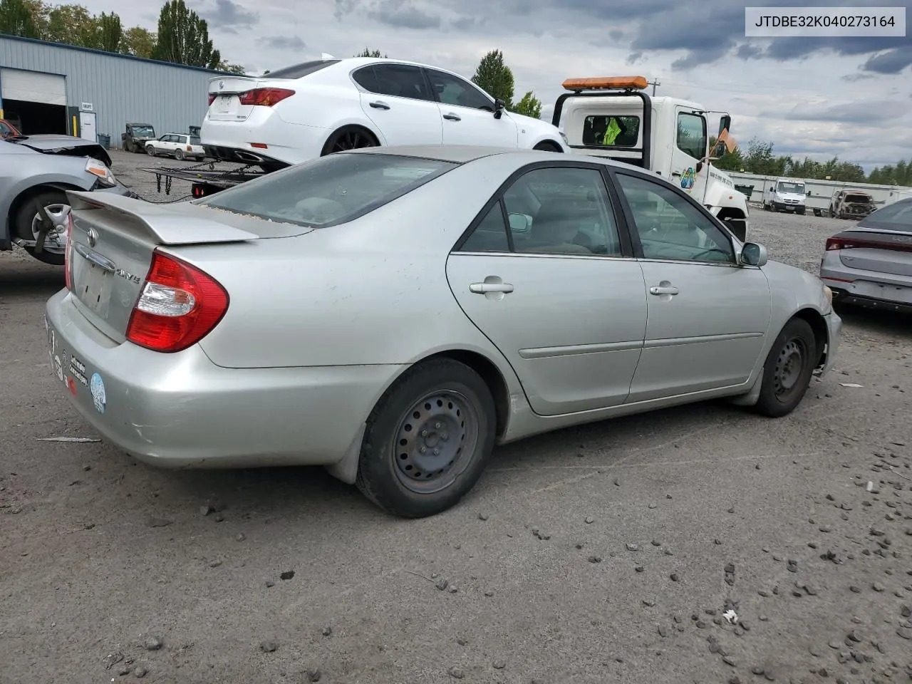 2004 Toyota Camry Le VIN: JTDBE32K040273164 Lot: 67246874