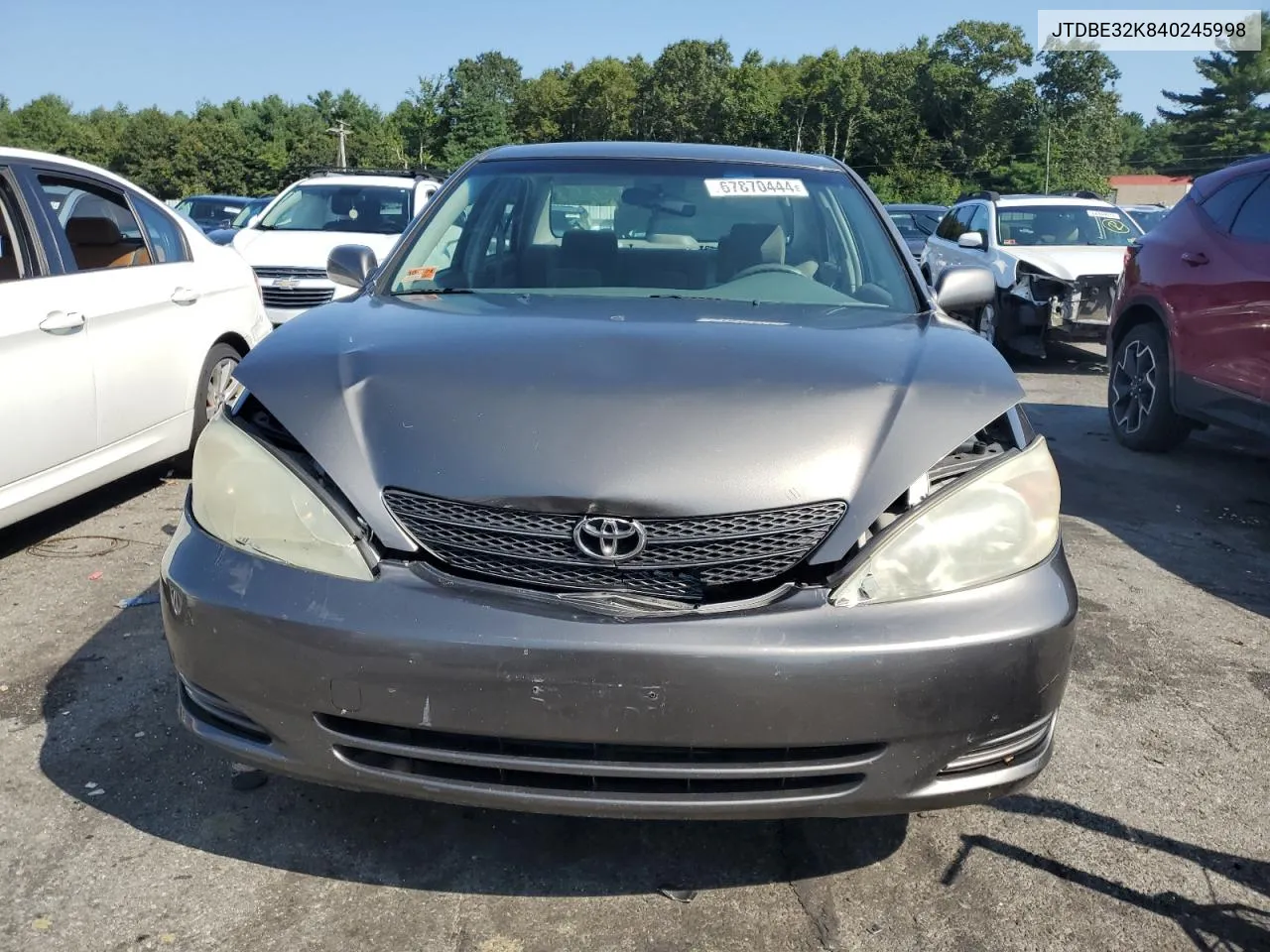 2004 Toyota Camry Le VIN: JTDBE32K840245998 Lot: 67870444