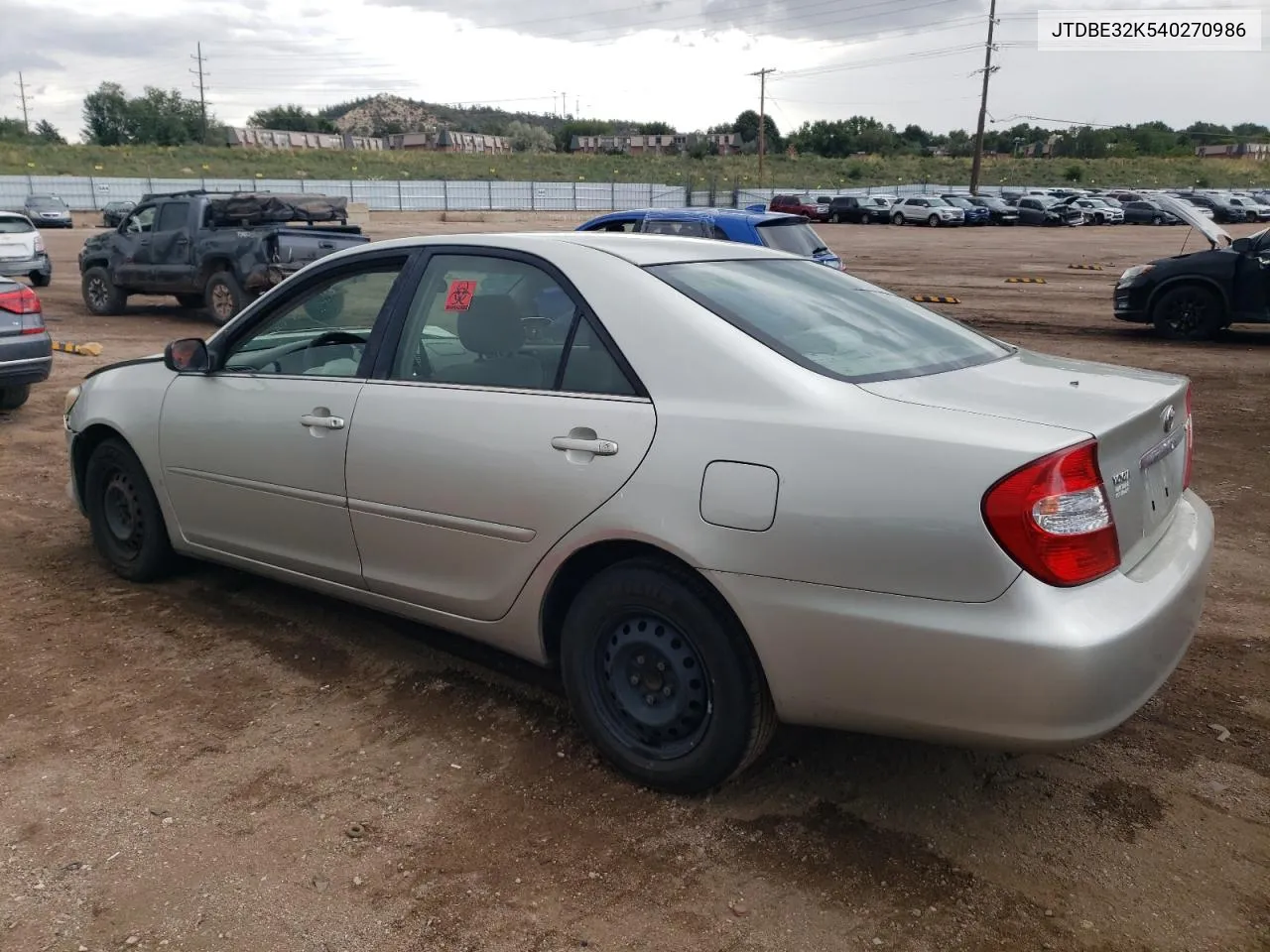 2004 Toyota Camry Le VIN: JTDBE32K540270986 Lot: 70373494