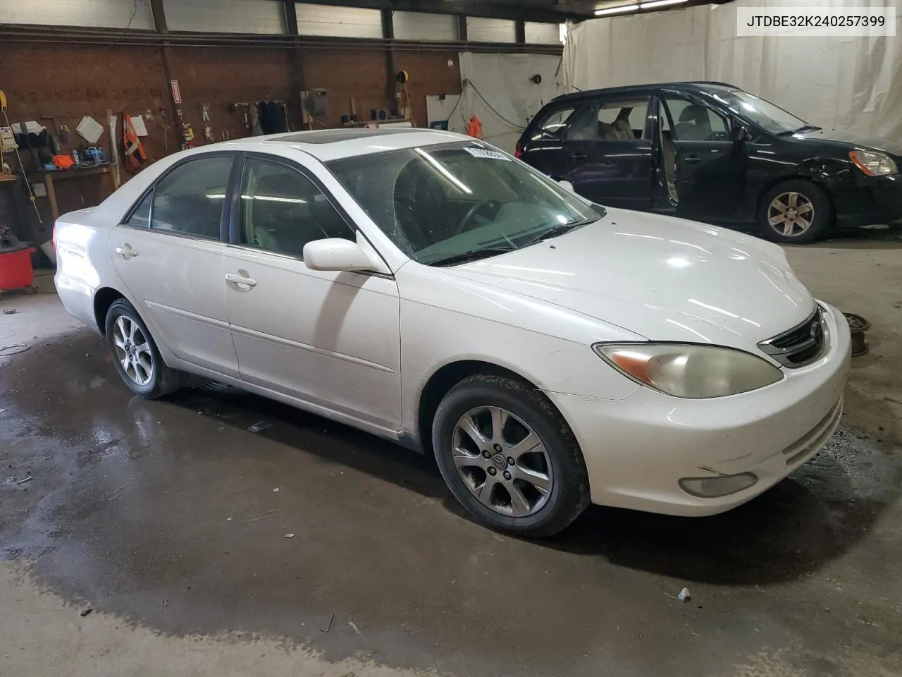 2004 Toyota Camry Le VIN: JTDBE32K240257399 Lot: 71058854