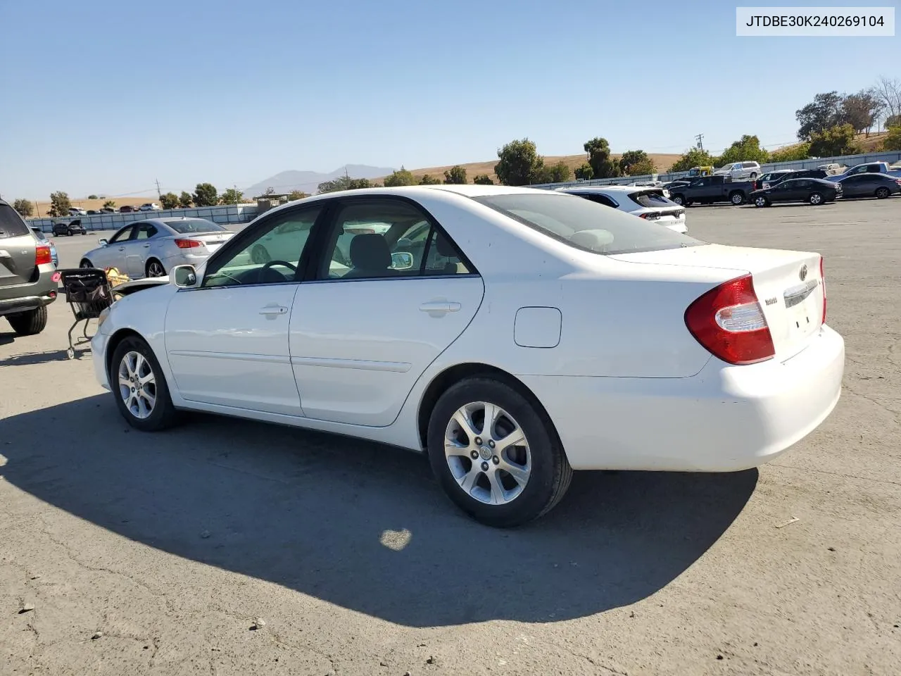 2004 Toyota Camry Le VIN: JTDBE30K240269104 Lot: 72653184