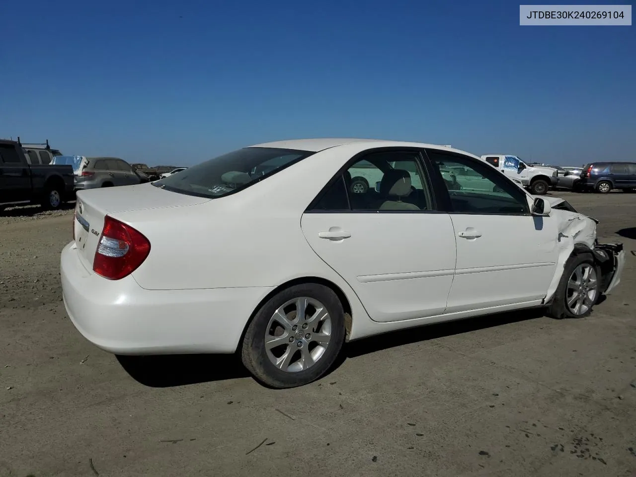 2004 Toyota Camry Le VIN: JTDBE30K240269104 Lot: 72653184