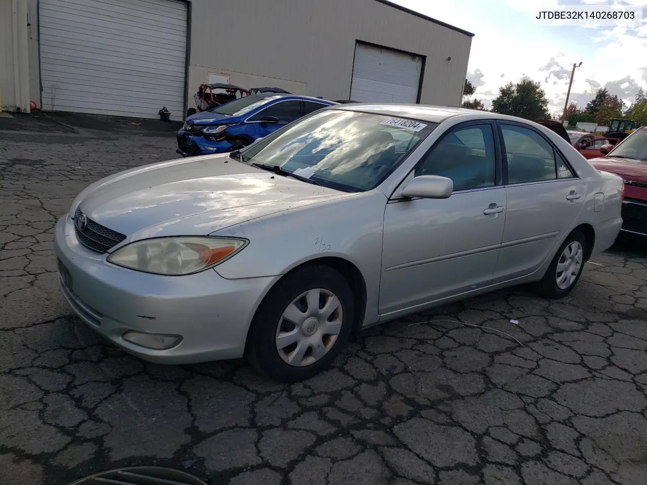 2004 Toyota Camry Le VIN: JTDBE32K140268703 Lot: 76418204