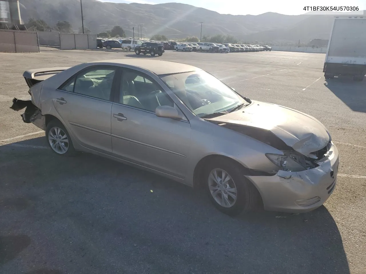 2004 Toyota Camry Le VIN: 4T1BF30K54U570306 Lot: 77150704