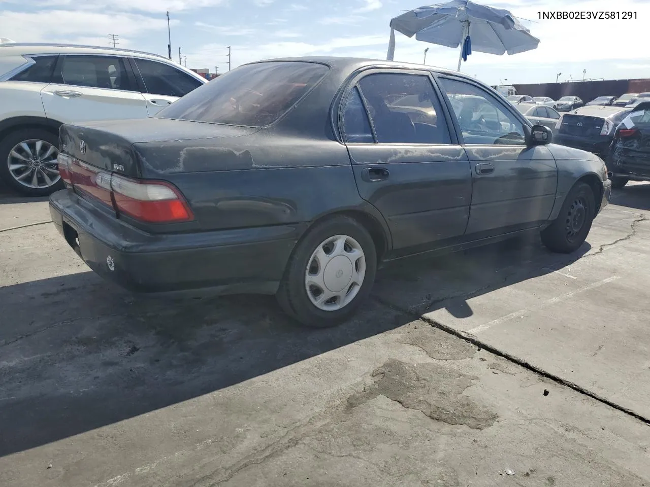 1997 Toyota Corolla Dx VIN: 1NXBB02E3VZ581291 Lot: 78121514