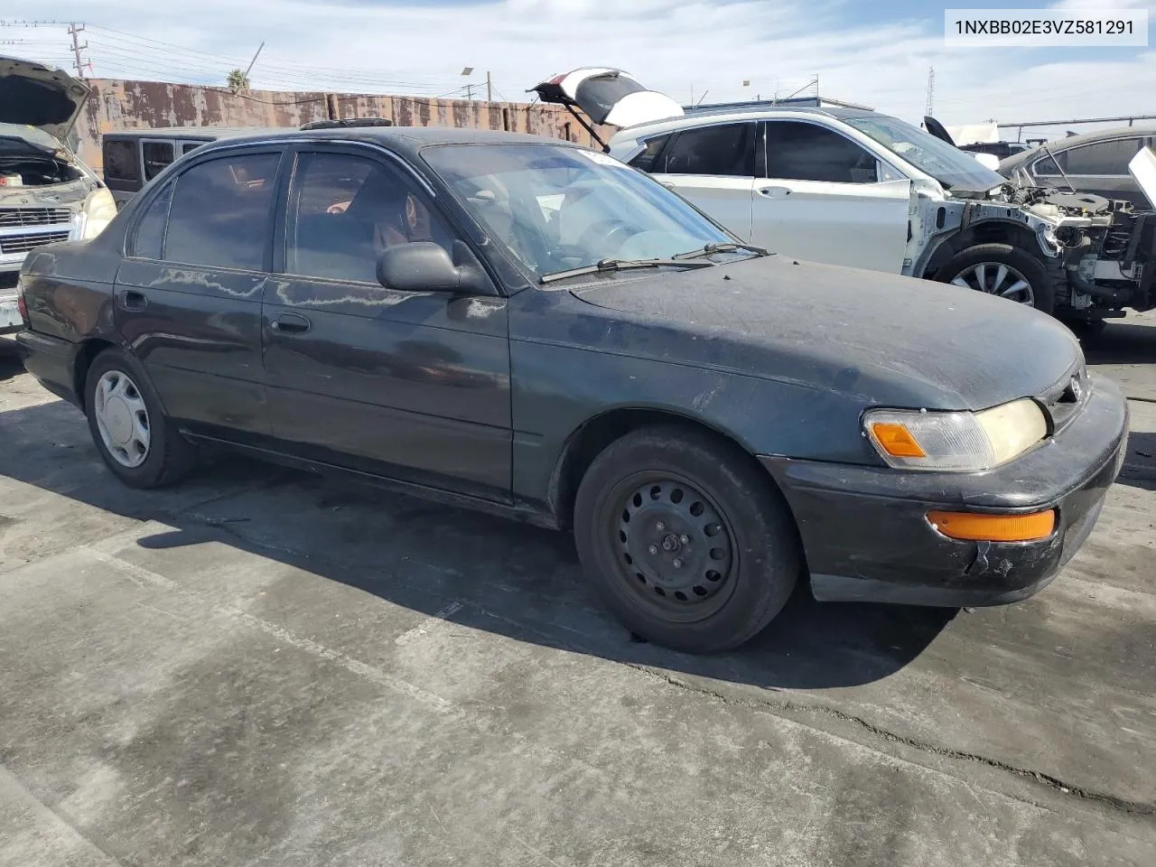 1997 Toyota Corolla Dx VIN: 1NXBB02E3VZ581291 Lot: 78121514