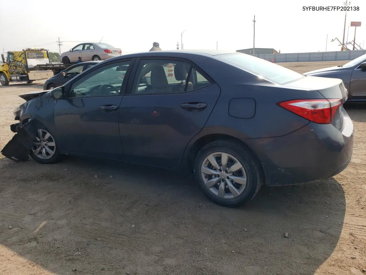 2015 Toyota Corolla L VIN: 5YFBURHE7FP202138 Lot: 64791024