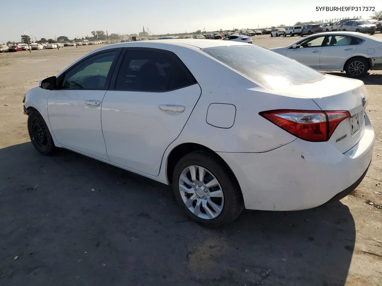 2015 Toyota Corolla L VIN: 5YFBURHE9FP317372 Lot: 77561154