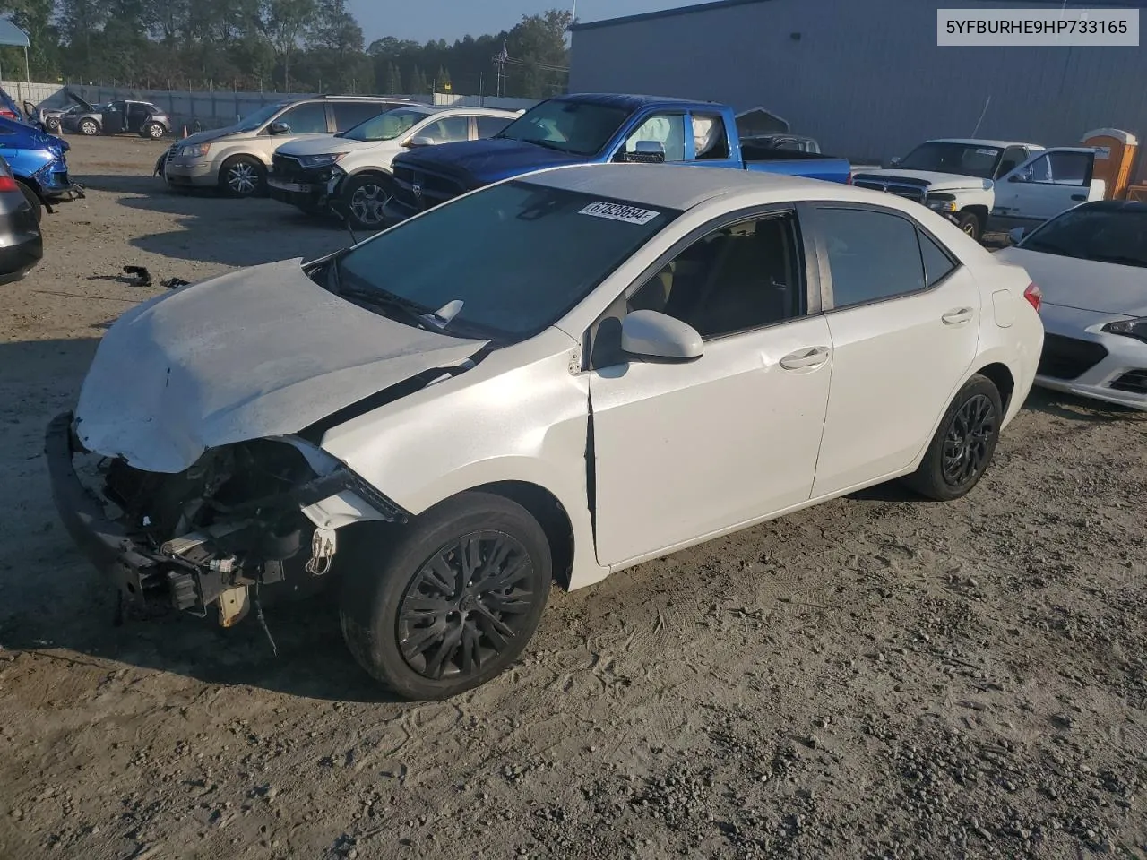 2017 Toyota Corolla L VIN: 5YFBURHE9HP733165 Lot: 67828694