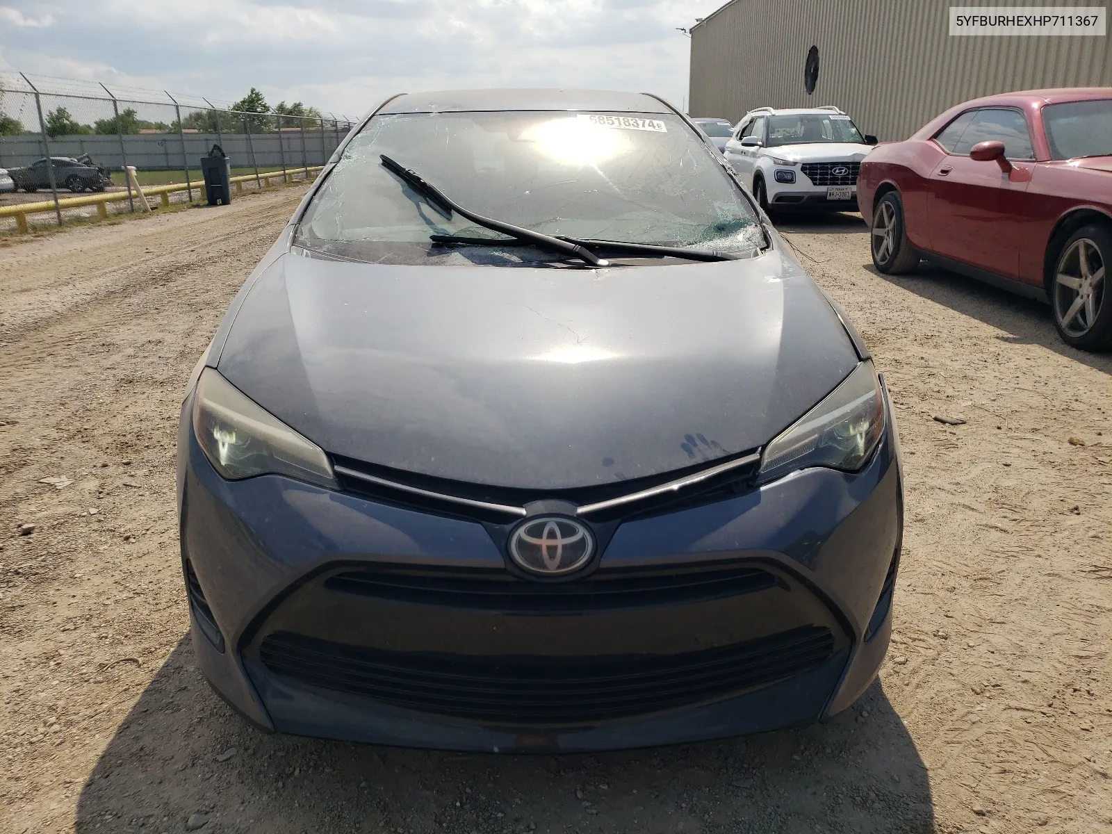 2017 Toyota Corolla L VIN: 5YFBURHEXHP711367 Lot: 68518374